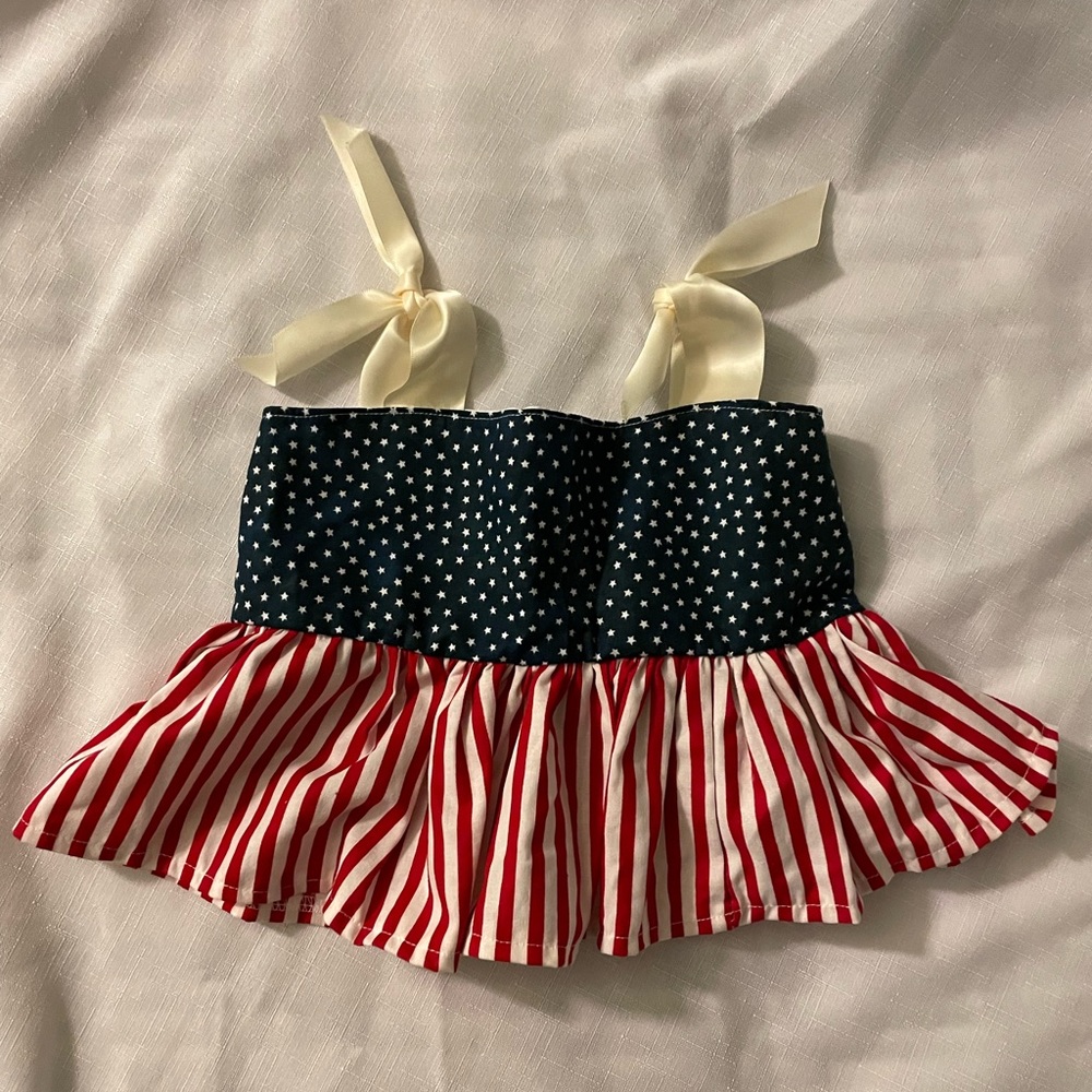 New with out tags Texas Moccs ruffle top 3/4T